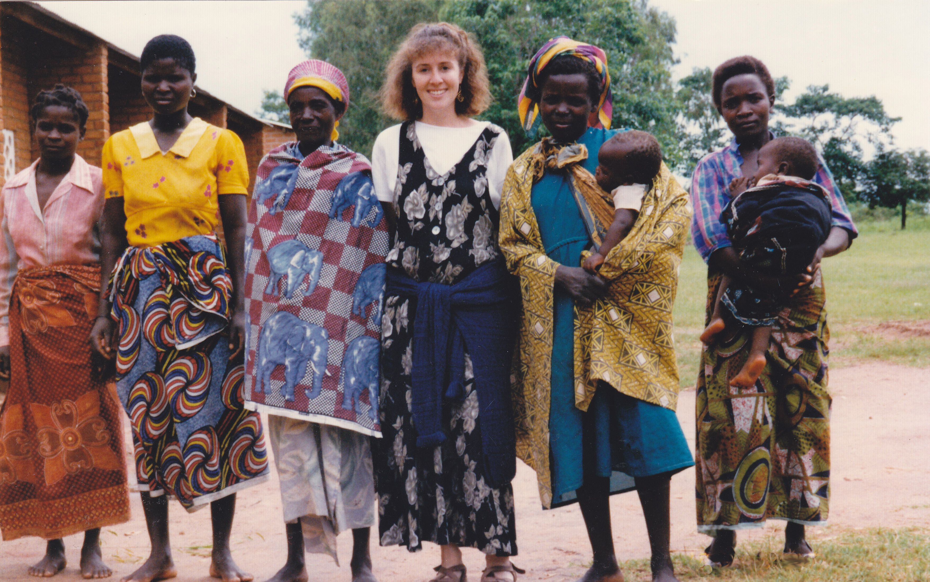 Author Shana Burg with villagers in Malawi photo
