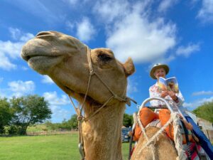 Kathi Appelt on a camel